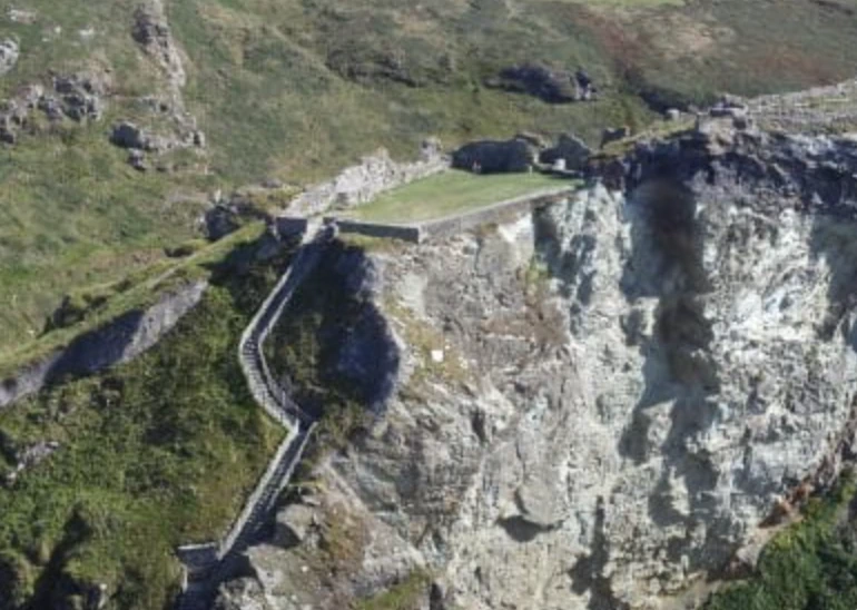 Steep steps and rocky cliffs at Tintagel Castle in Cornwall during our 2014 visit.